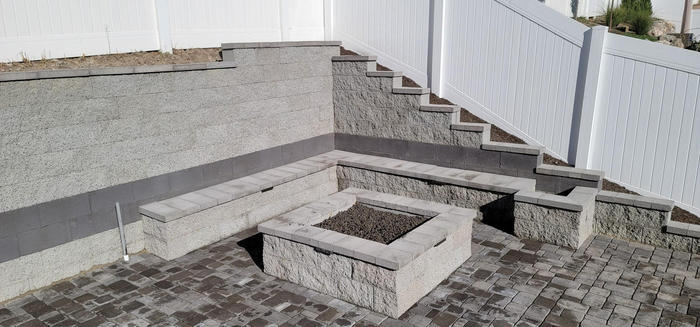 Stone fire pit with seating area