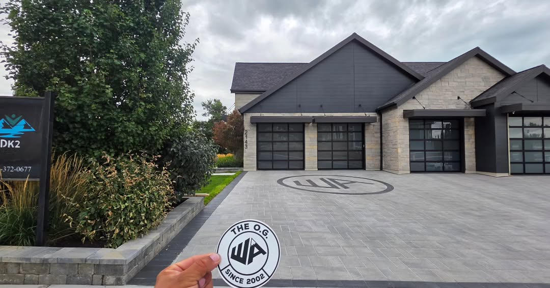 Professional hardscaping with custom pavers and retaining walls