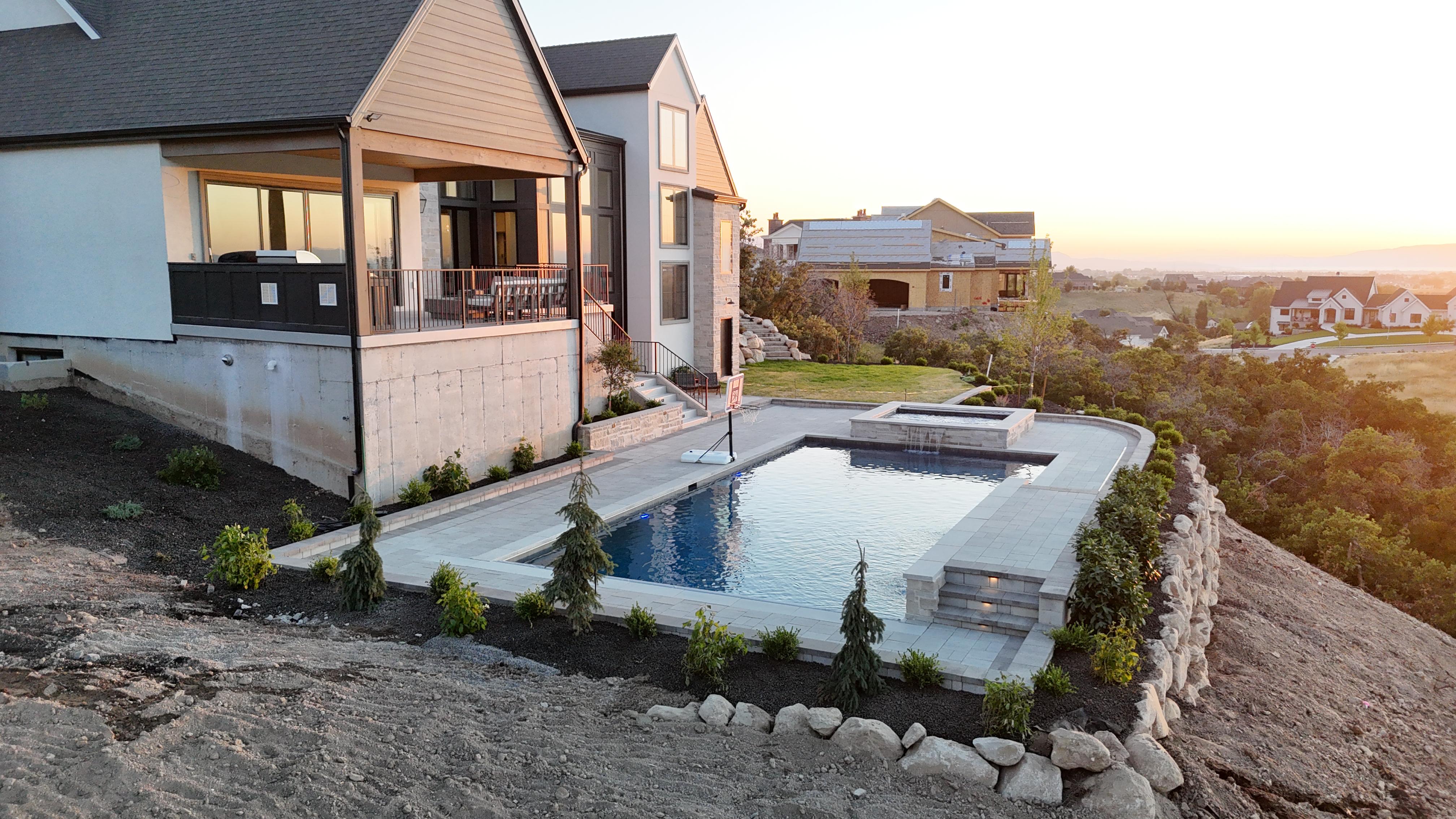 Backyard pool with landscaping